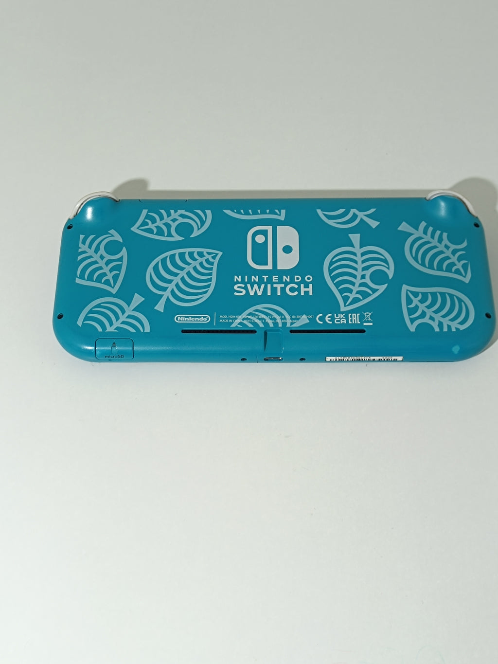Nintendo Switch Lite Konsole - Animal Crossing Design, mit Ladegerät