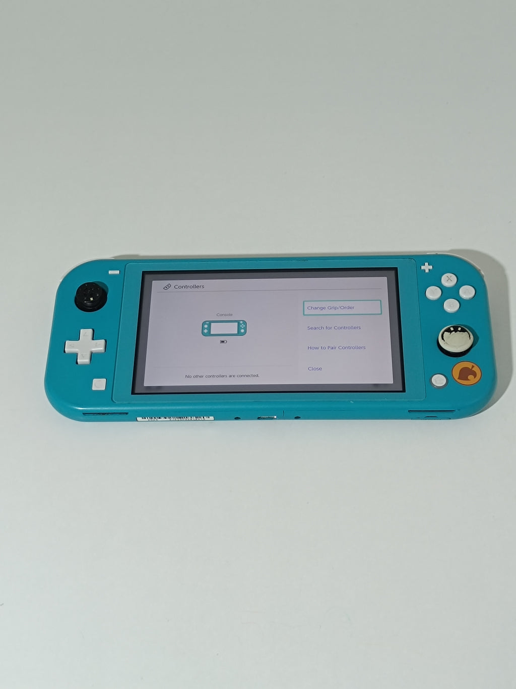 Nintendo Switch Lite Konsole - Animal Crossing Design, mit Ladegerät