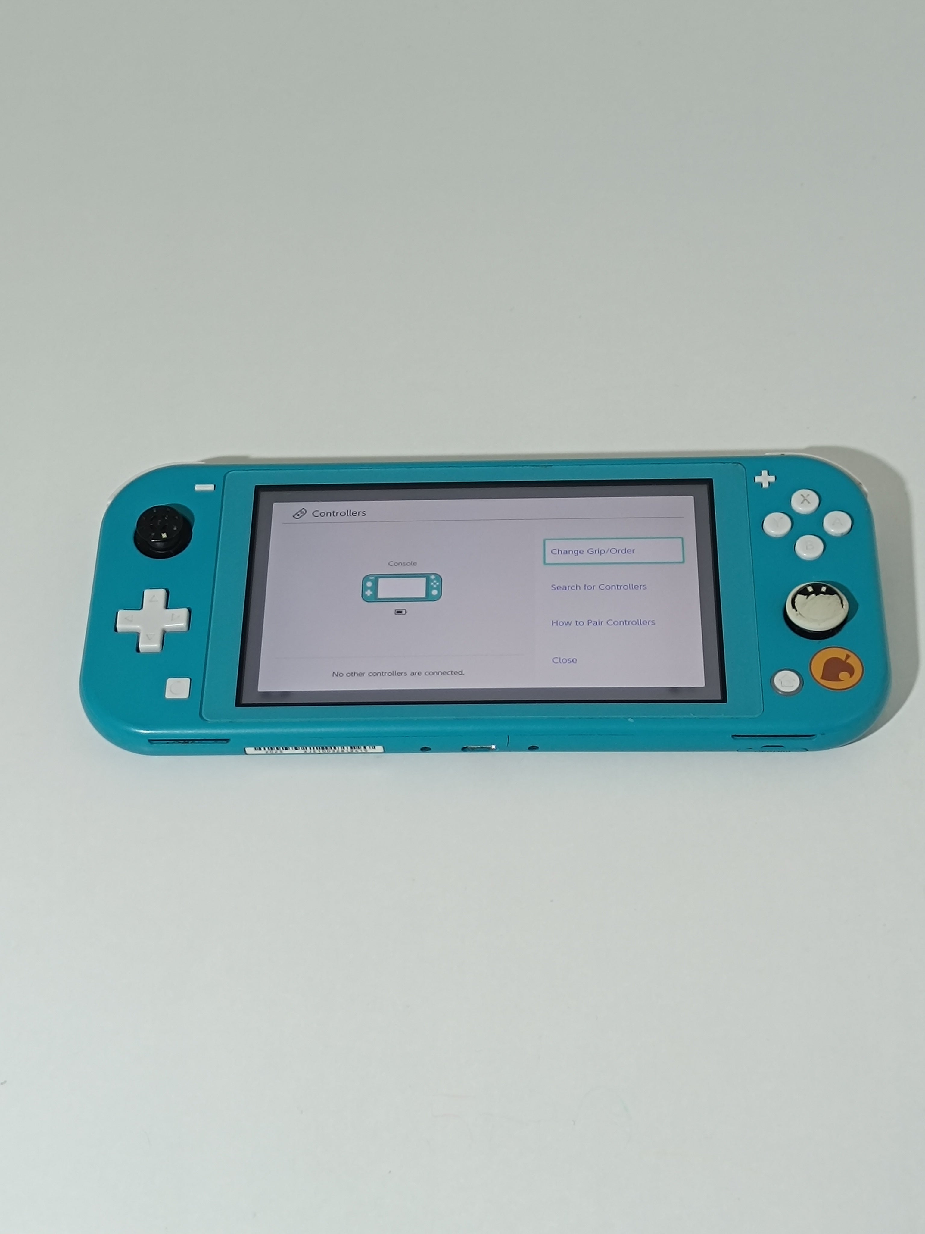 Nintendo Switch Lite Konsole - Animal Crossing Design, mit Ladegerät