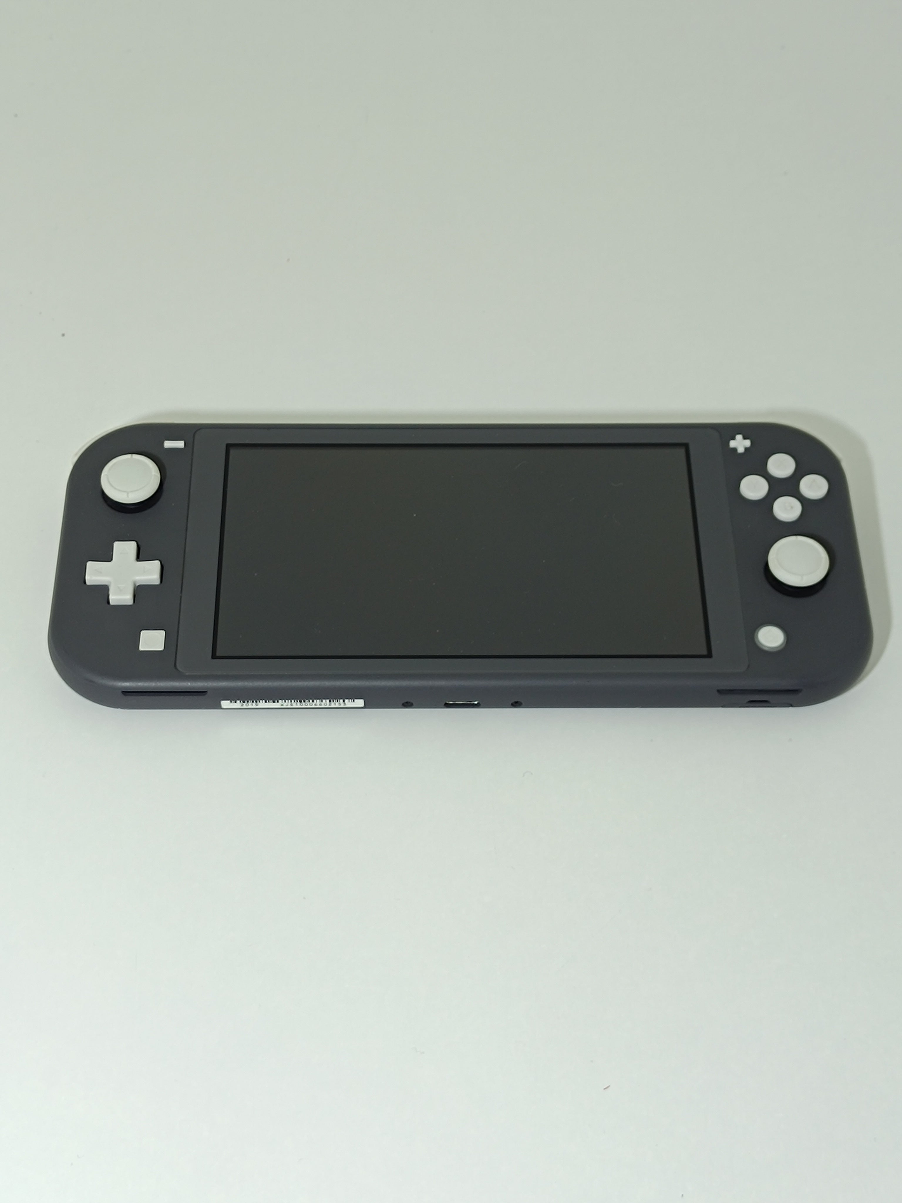 Nintendo Switch Lite | Grau | Inkl. Originalverpackung & Ladegerät