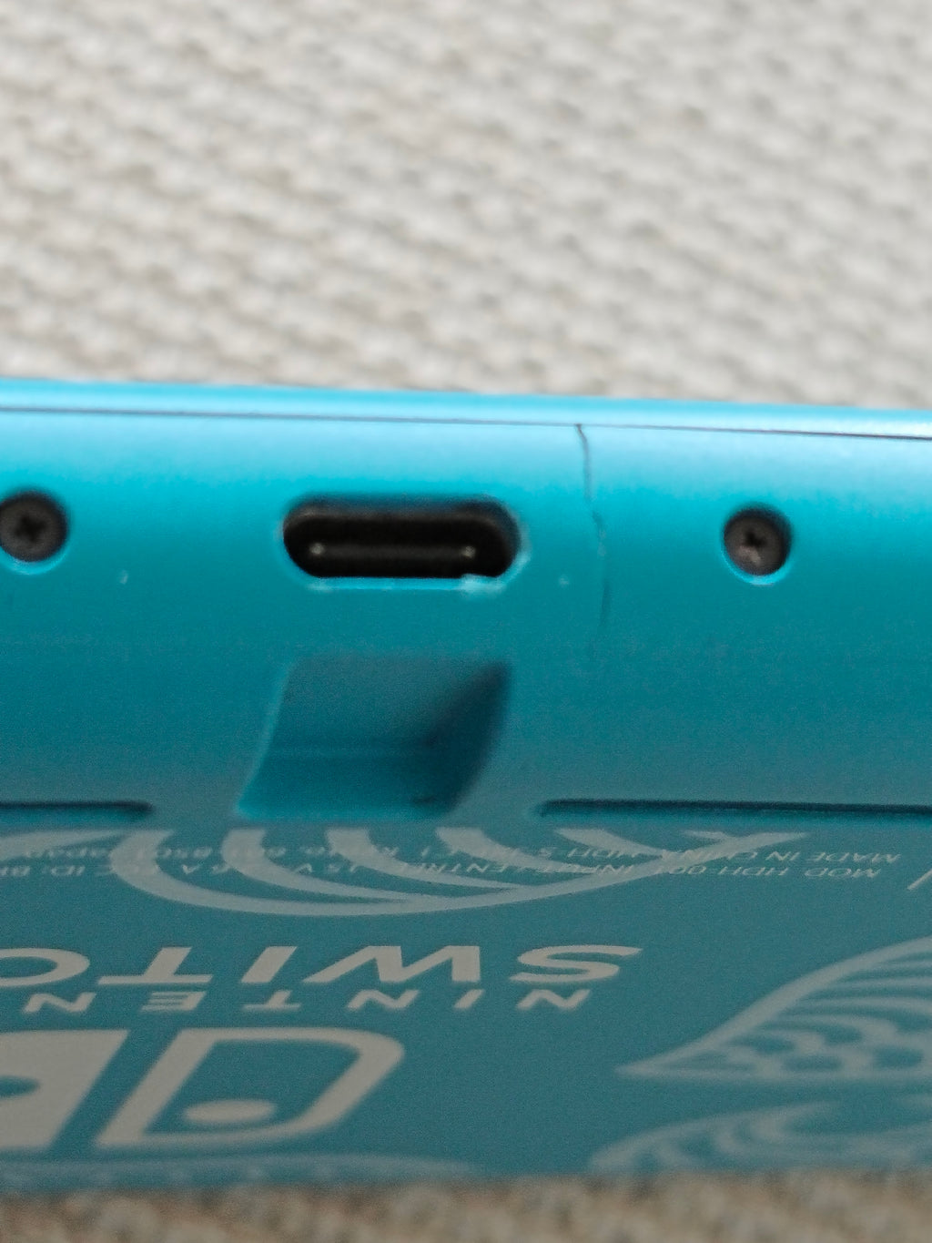 Nintendo Switch Lite Konsole - Animal Crossing Design, mit Ladegerät
