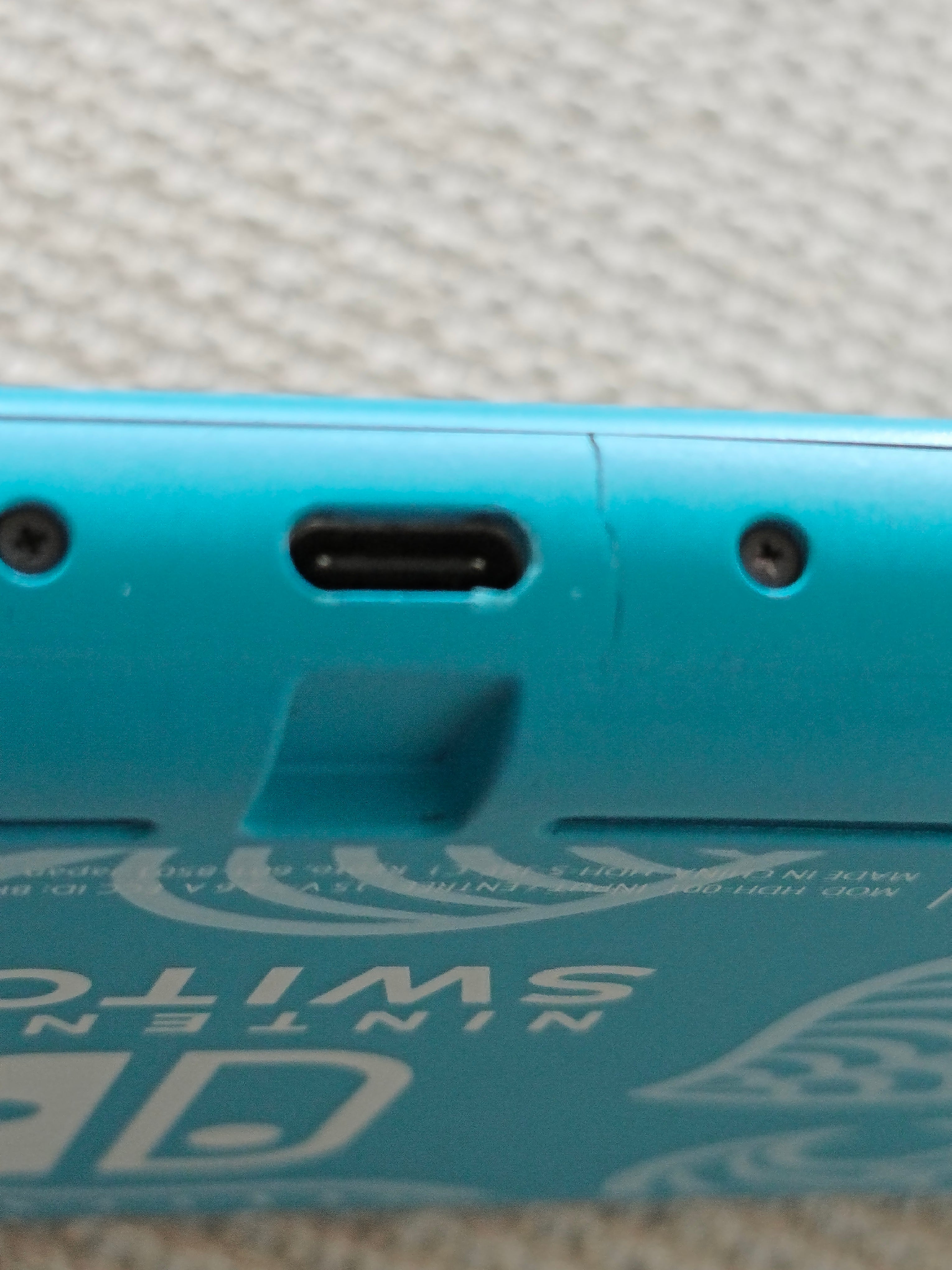 Nintendo Switch Lite Konsole - Animal Crossing Design, mit Ladegerät