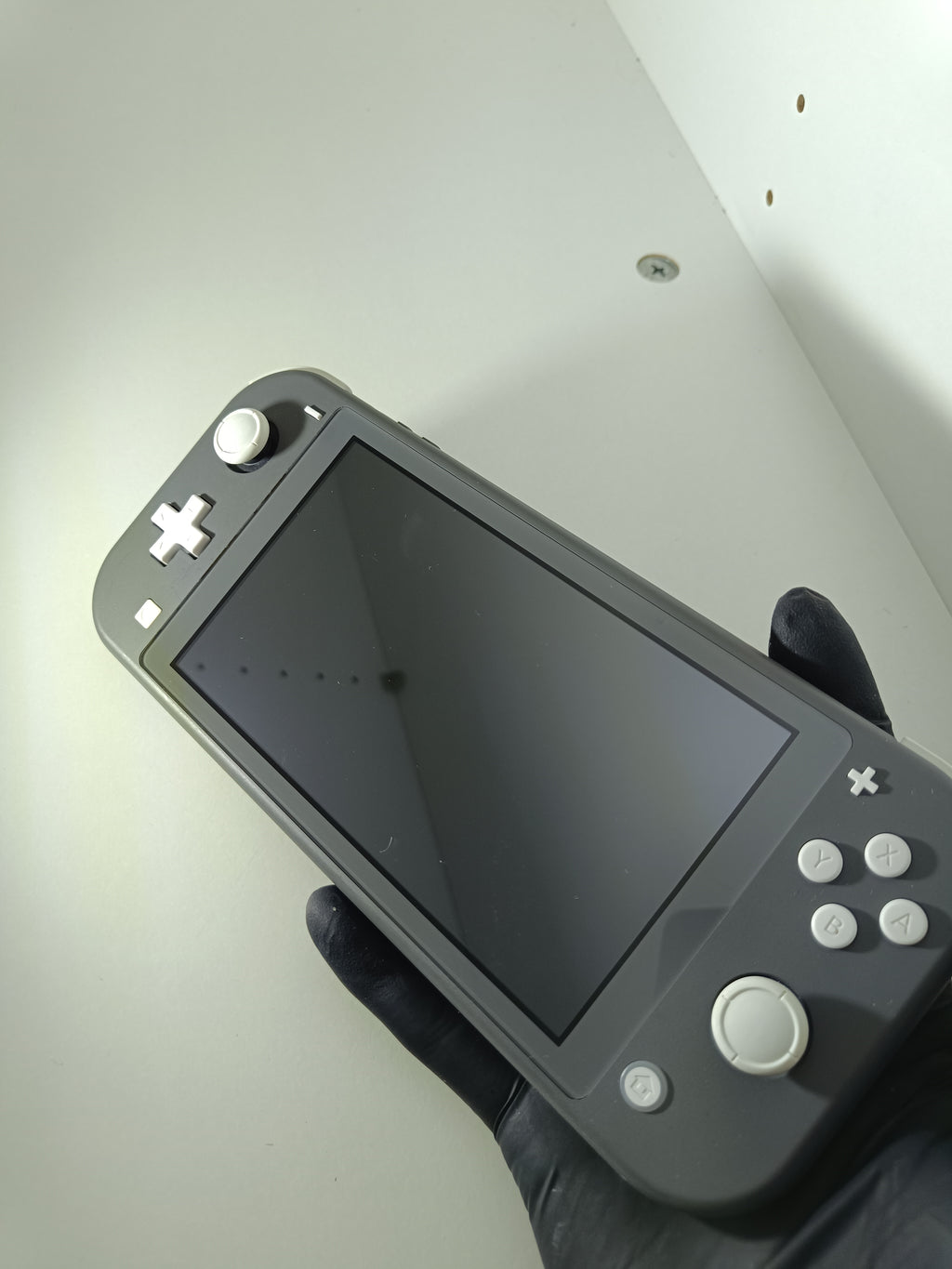 Nintendo Switch Lite | Grau | Inkl. Originalverpackung & Ladegerät