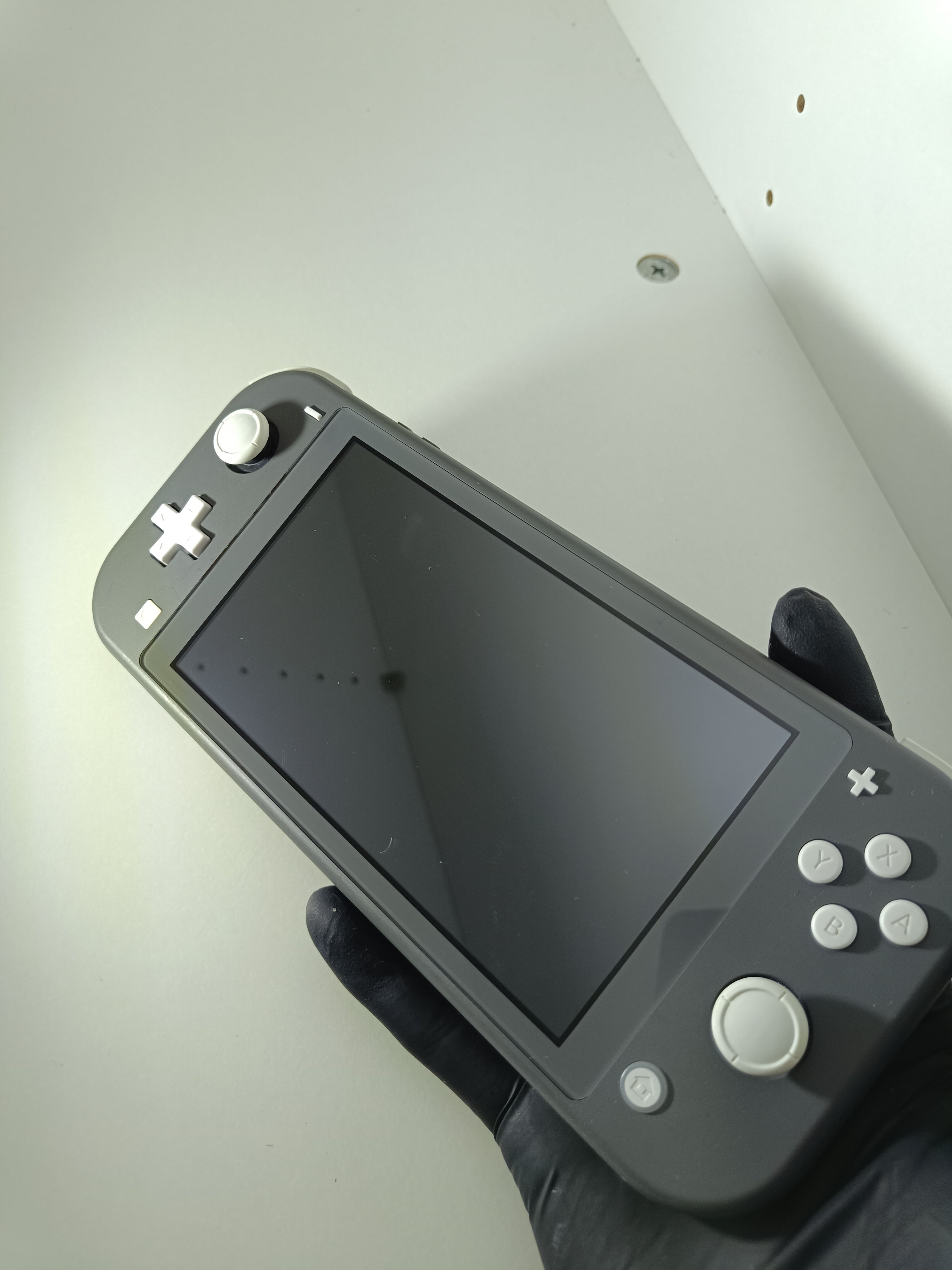 Nintendo Switch Lite | Grau | Inkl. Originalverpackung & Ladegerät