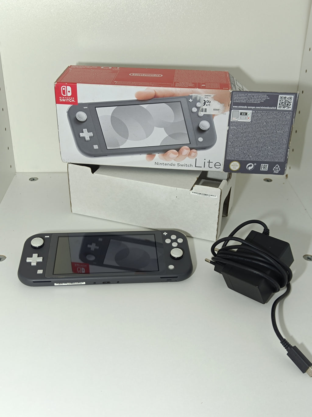 Nintendo Switch Lite | Grau | Inkl. Originalverpackung & Ladegerät